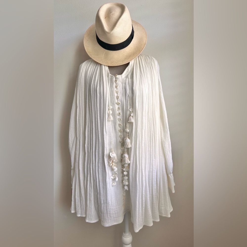 Cream colored mini dress with seashells and tassels